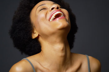 woman laughing stress busters