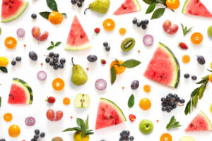 fruits and veggies on white background